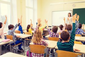 Students raisng hands